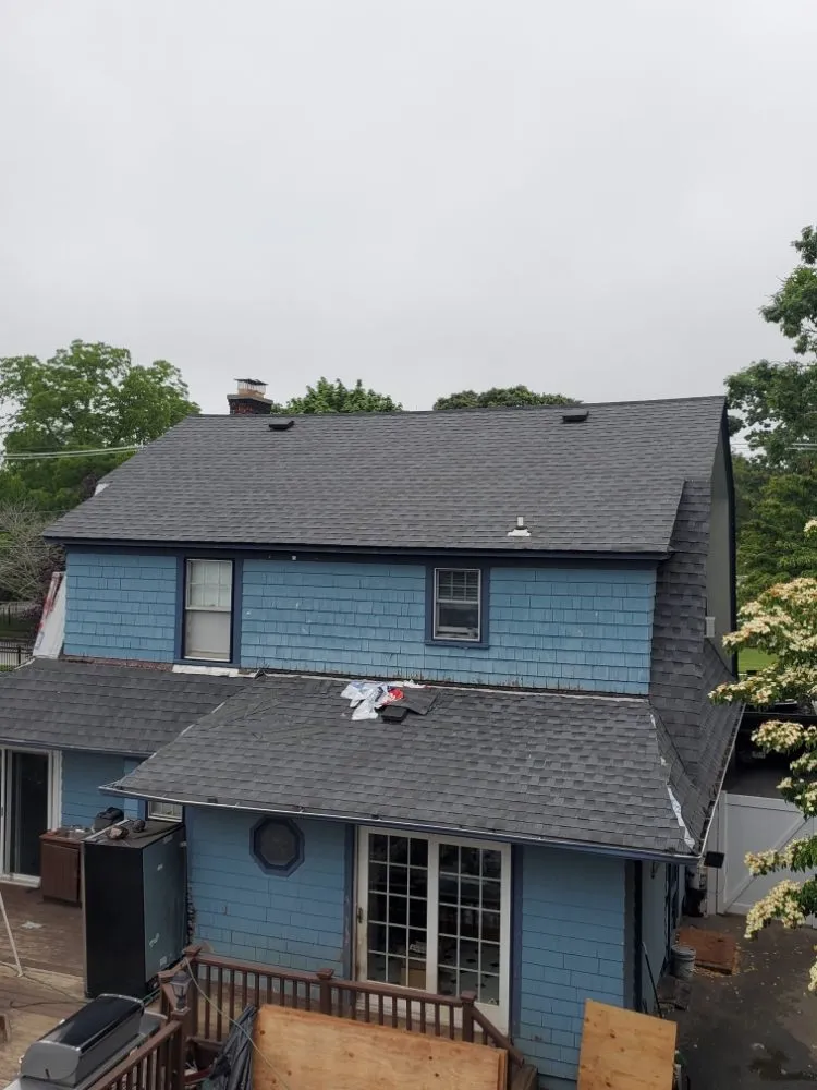 Slide of Vidal Roofing