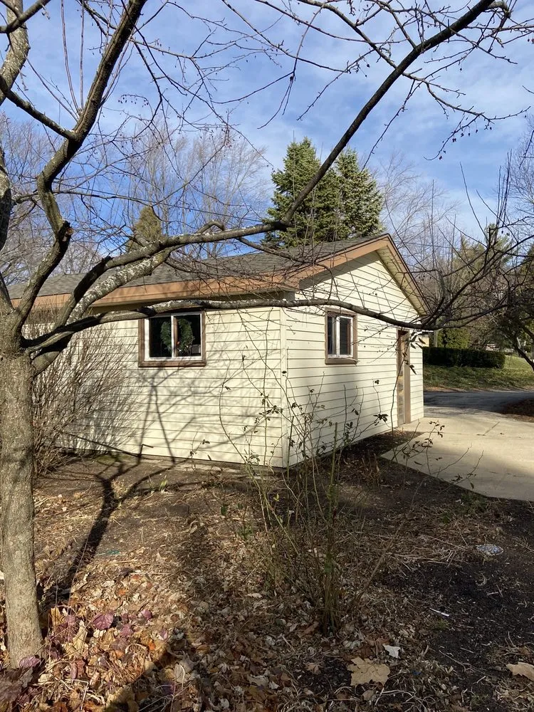 Slide of Vidmar Roofing