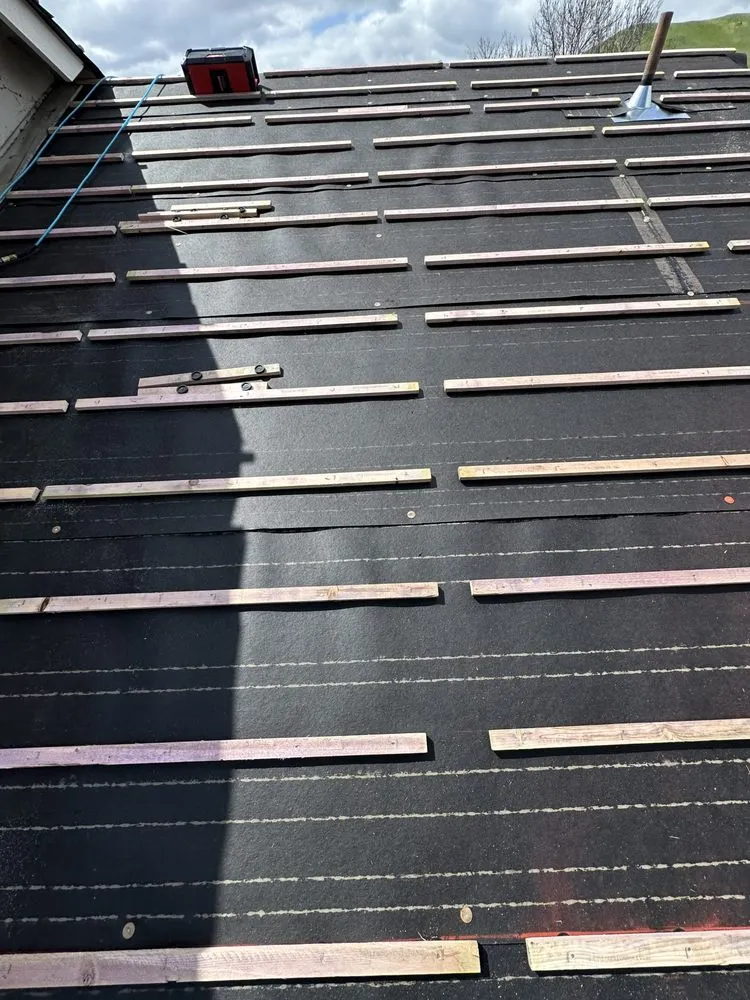 Slide of Vigil Roofing