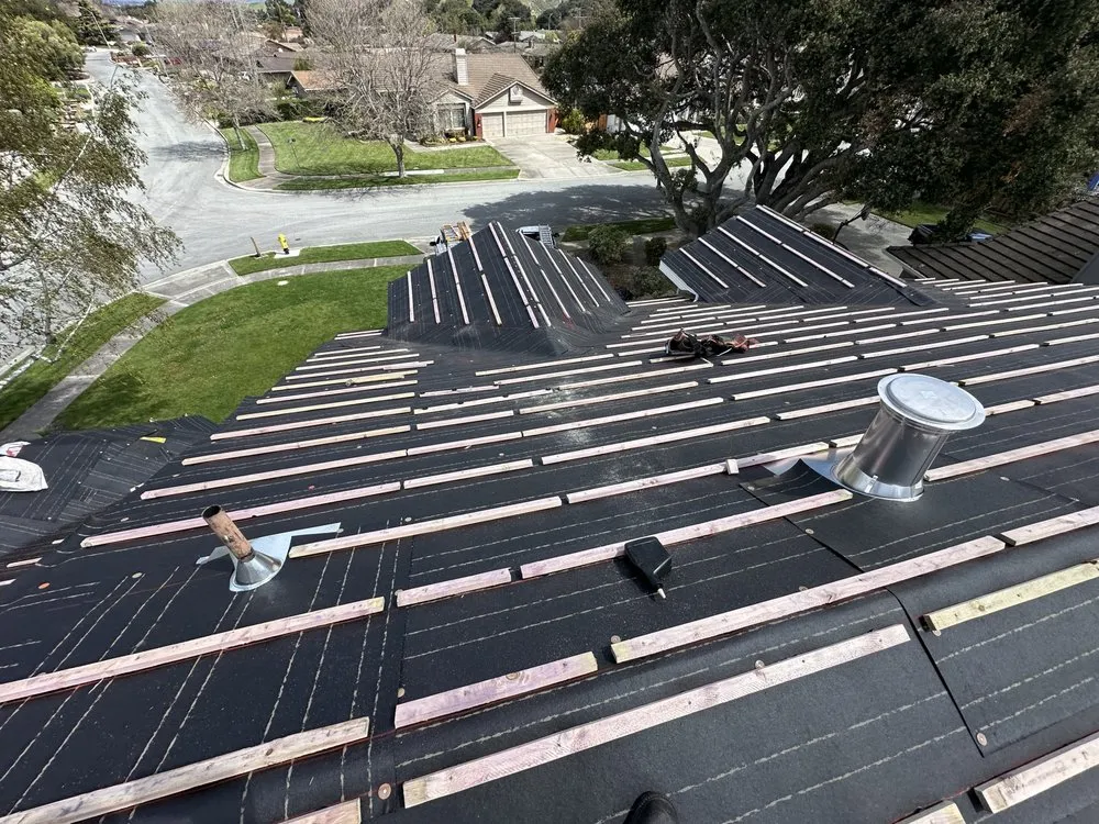 Slide of Vigil Roofing