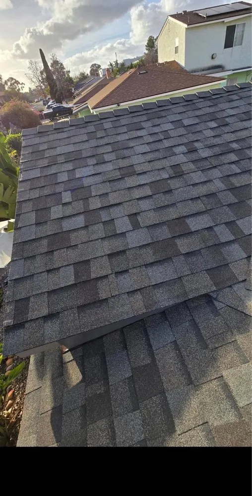 Slide of Vigil's Roofing