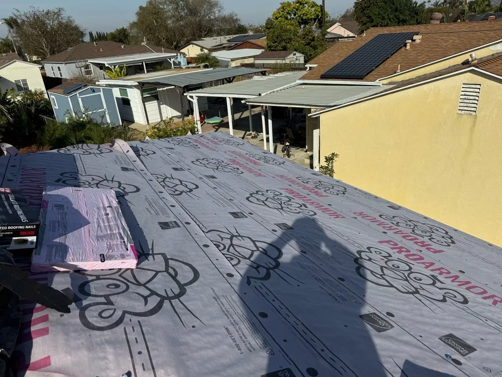 Slide of Vigil's Roofing