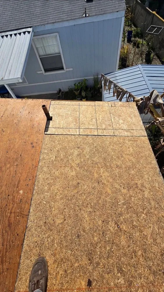 Slide of Vigil's Roofing