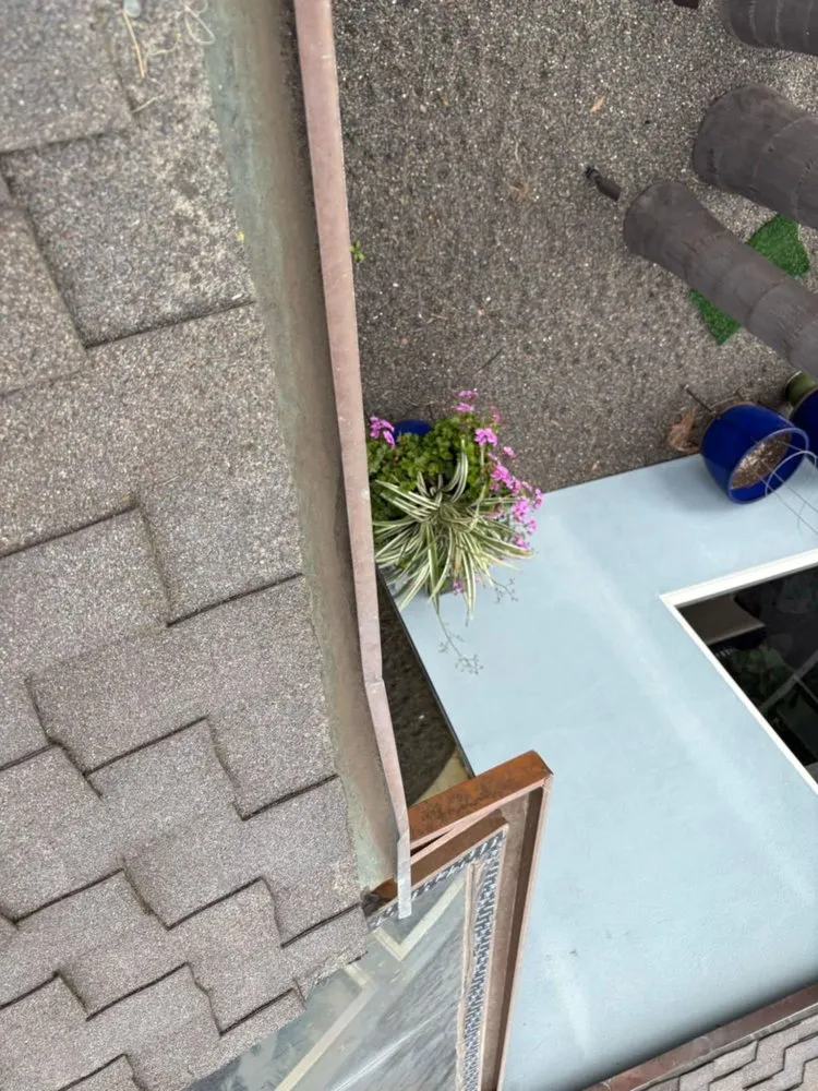 Slide of Vigil's Roofing