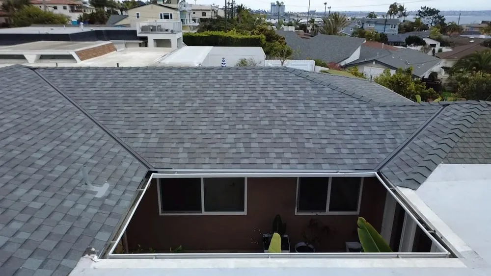 Slide of Vigil's Roofing