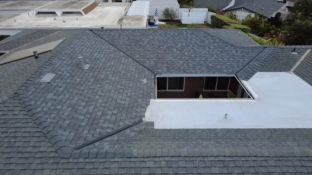 Slide of Vigil's Roofing