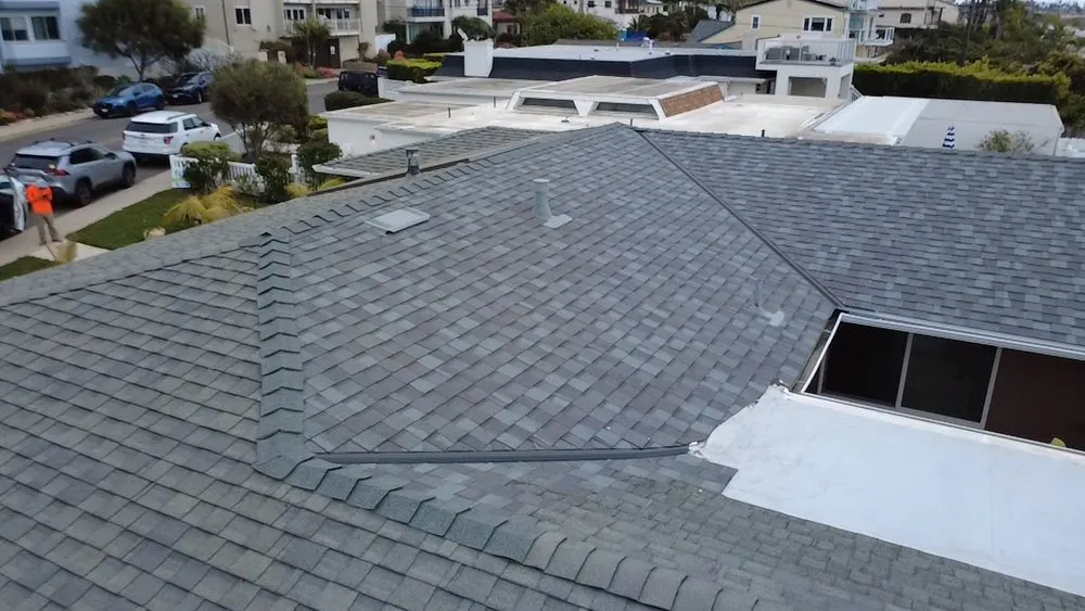 Slide of Vigil's Roofing