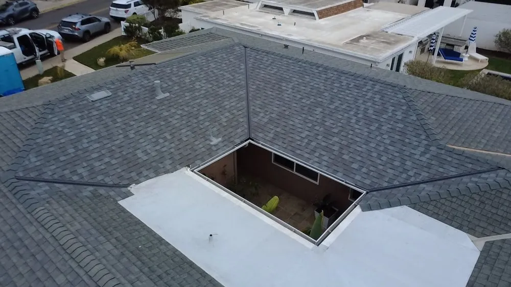 Slide of Vigil's Roofing