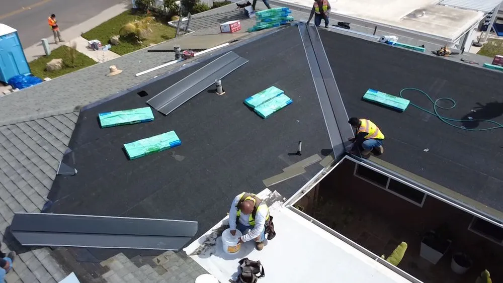 Slide of Vigil's Roofing