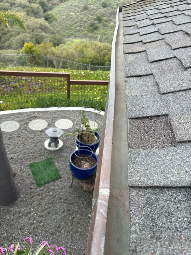 Slide of Vigil's Roofing