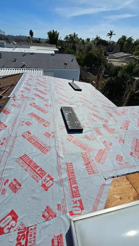 Slide of Vigil's Roofing