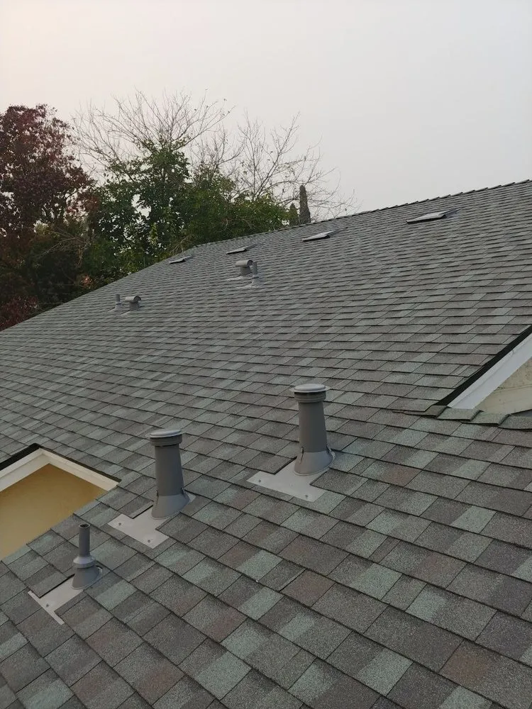 Slide of VIK Quality Roofing