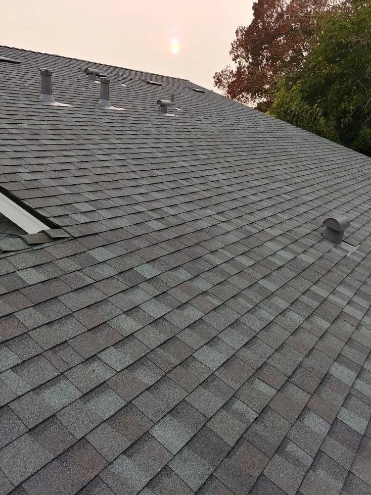 Slide of VIK Quality Roofing