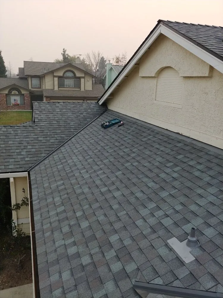 Slide of VIK Quality Roofing