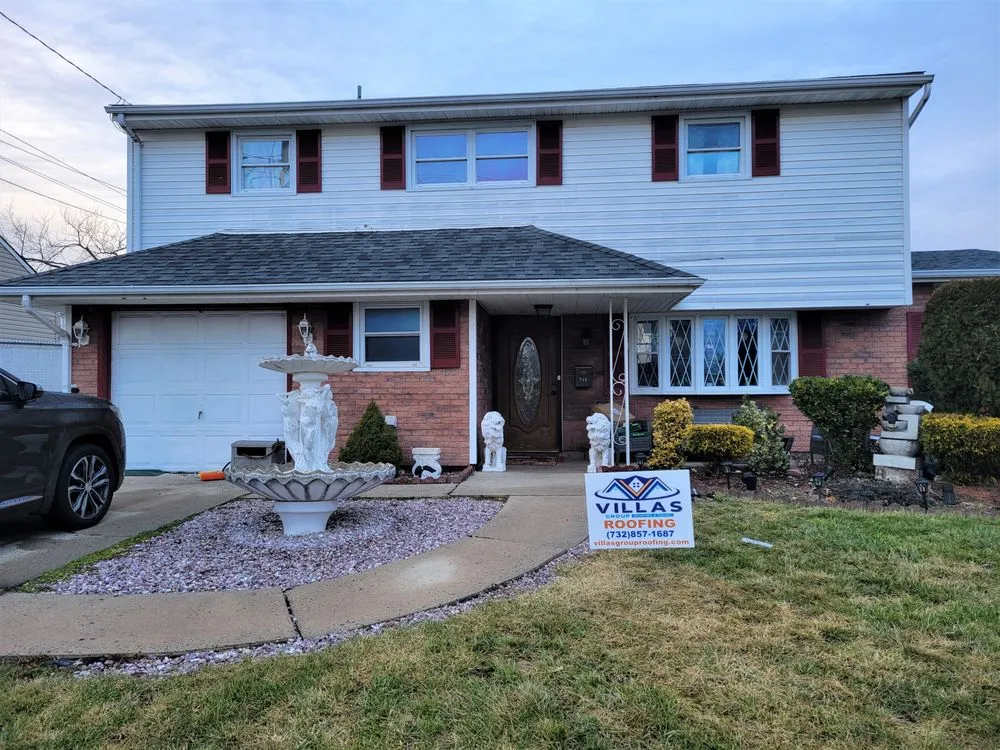 Slide of Villas Group Roofing