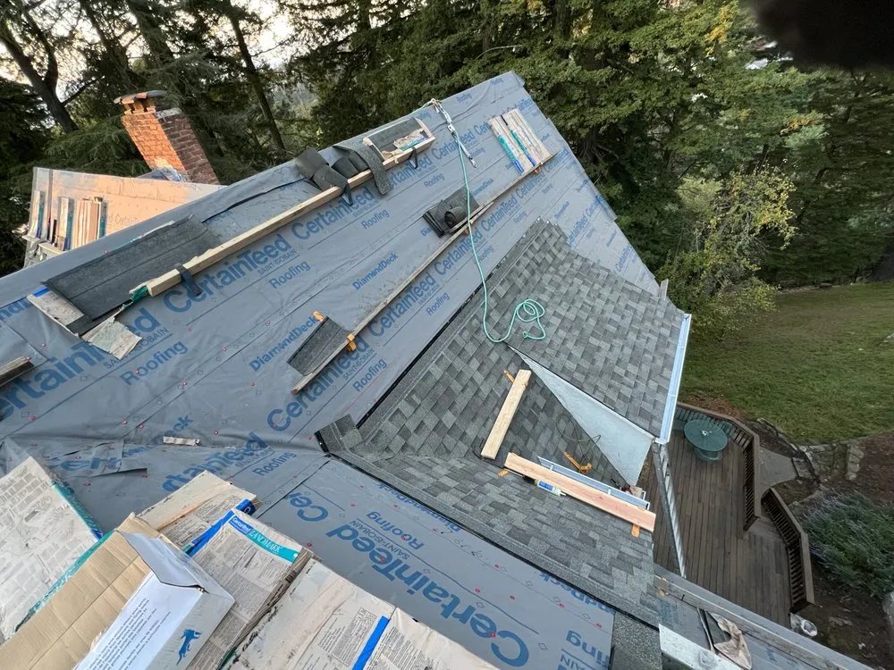 Slide of Villa's Roofing Company