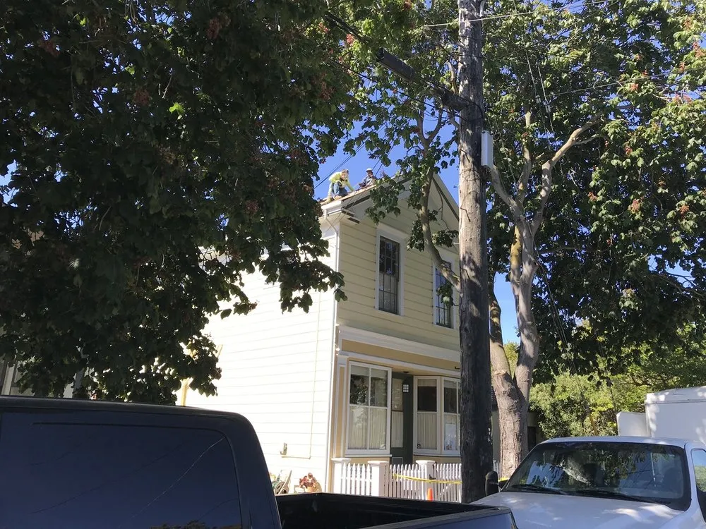 Slide of Villa's Roofing Company