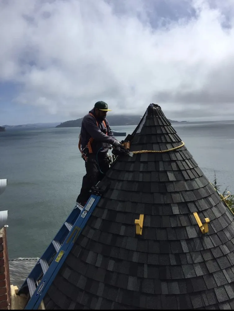 Slide of Villa's Roofing Company