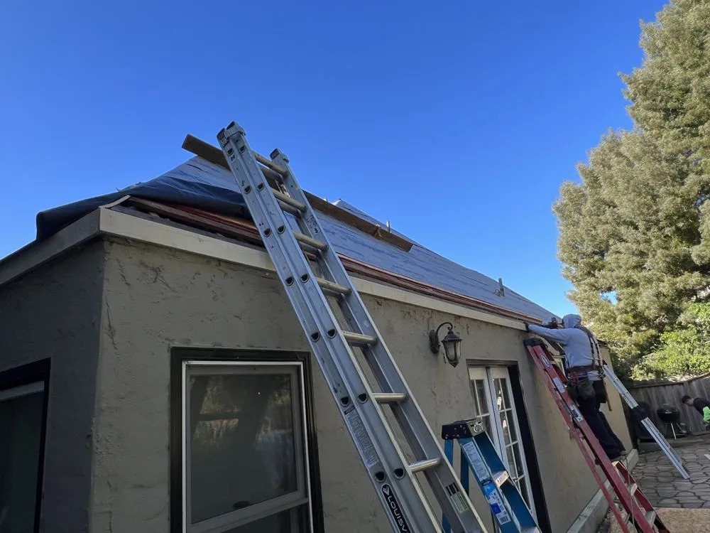 Slide of Villa's Roofing Company