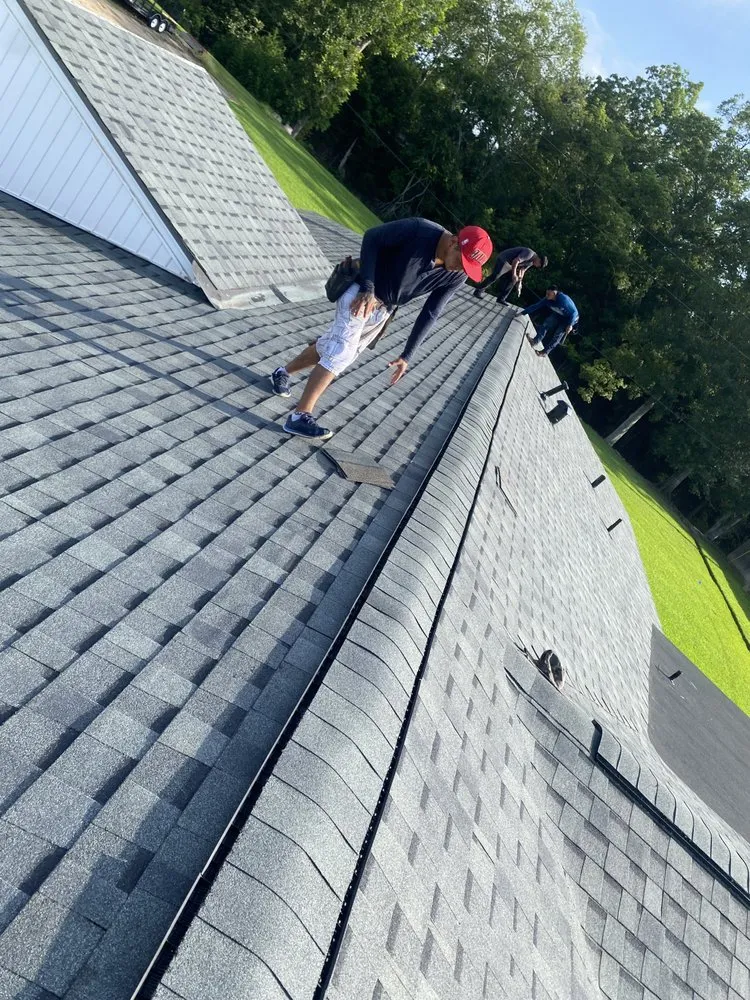 Slide of Vincents Roofing