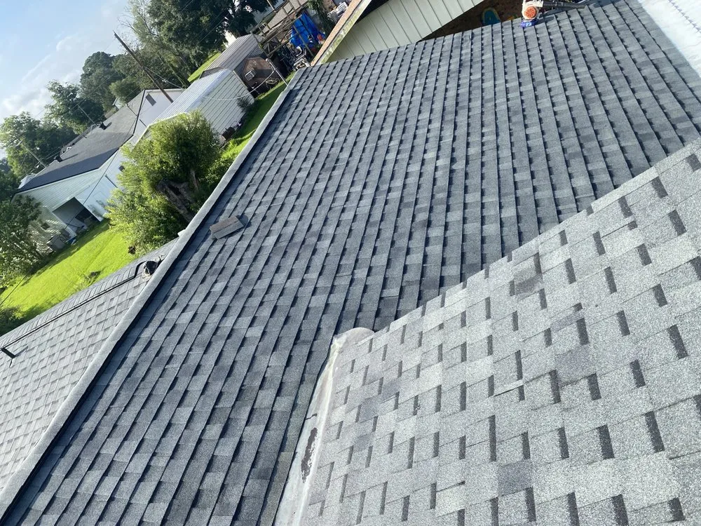 Slide of Vincents Roofing