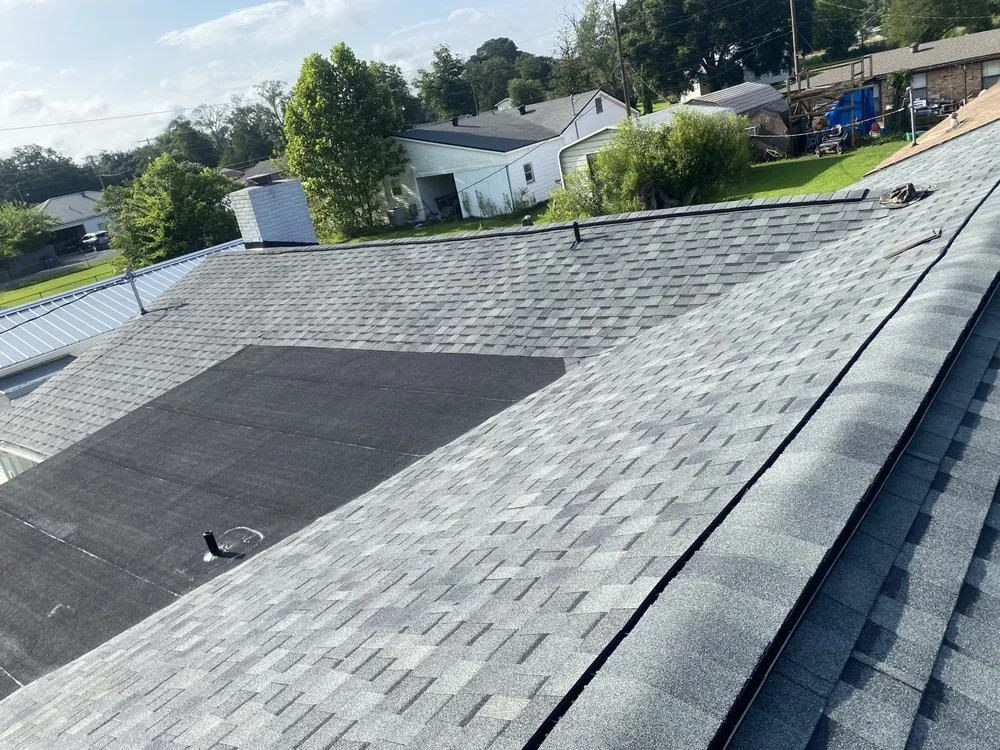 Slide of Vincents Roofing