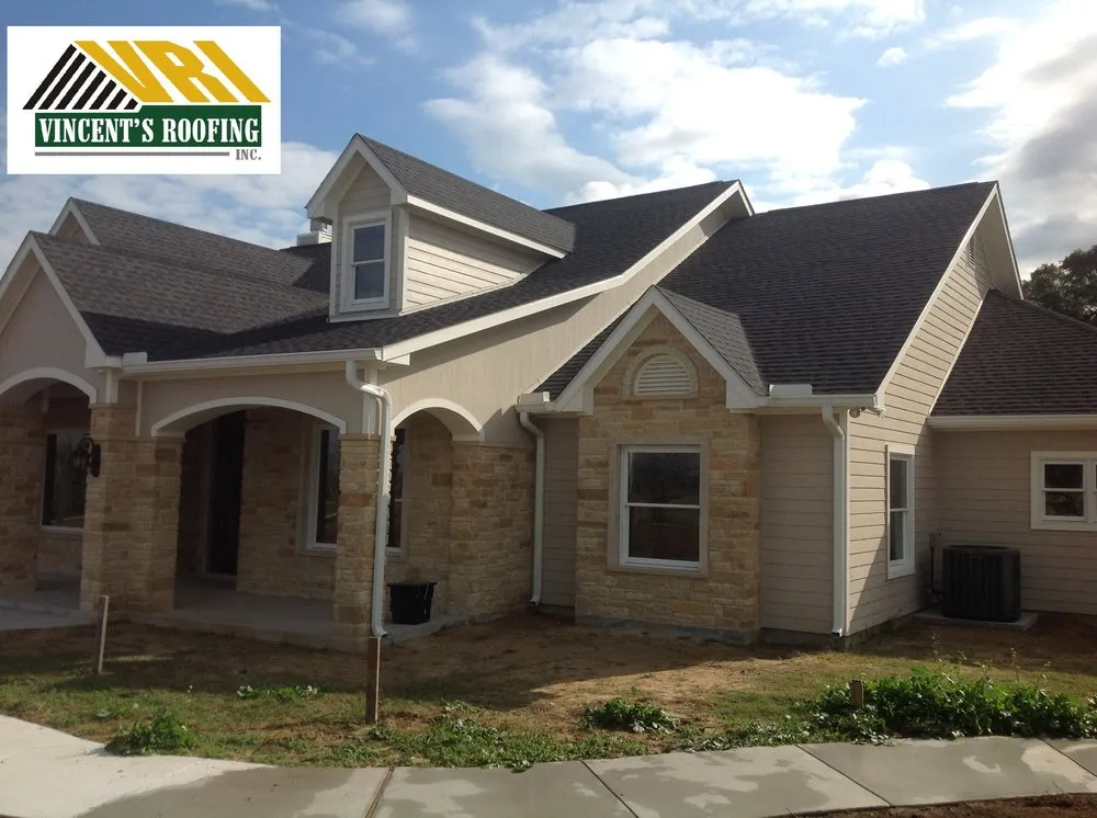 Slide of Vincent's Roofing