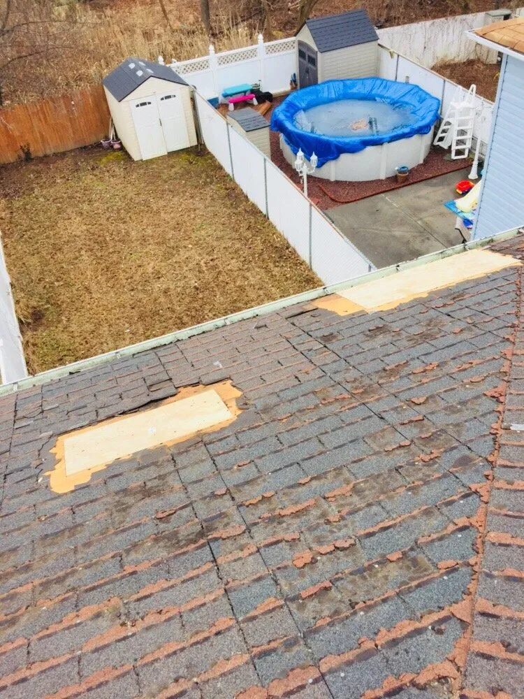 Slide of Vinny's Roofing & Home Improvement