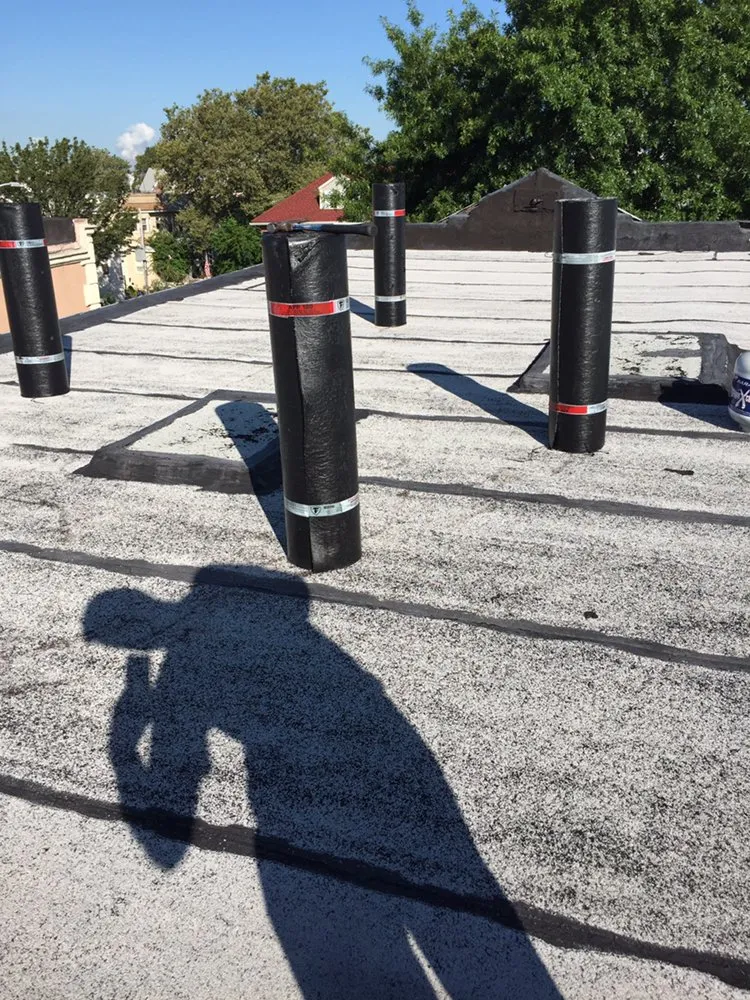 Slide of Vinny's Roofing & Home Improvement