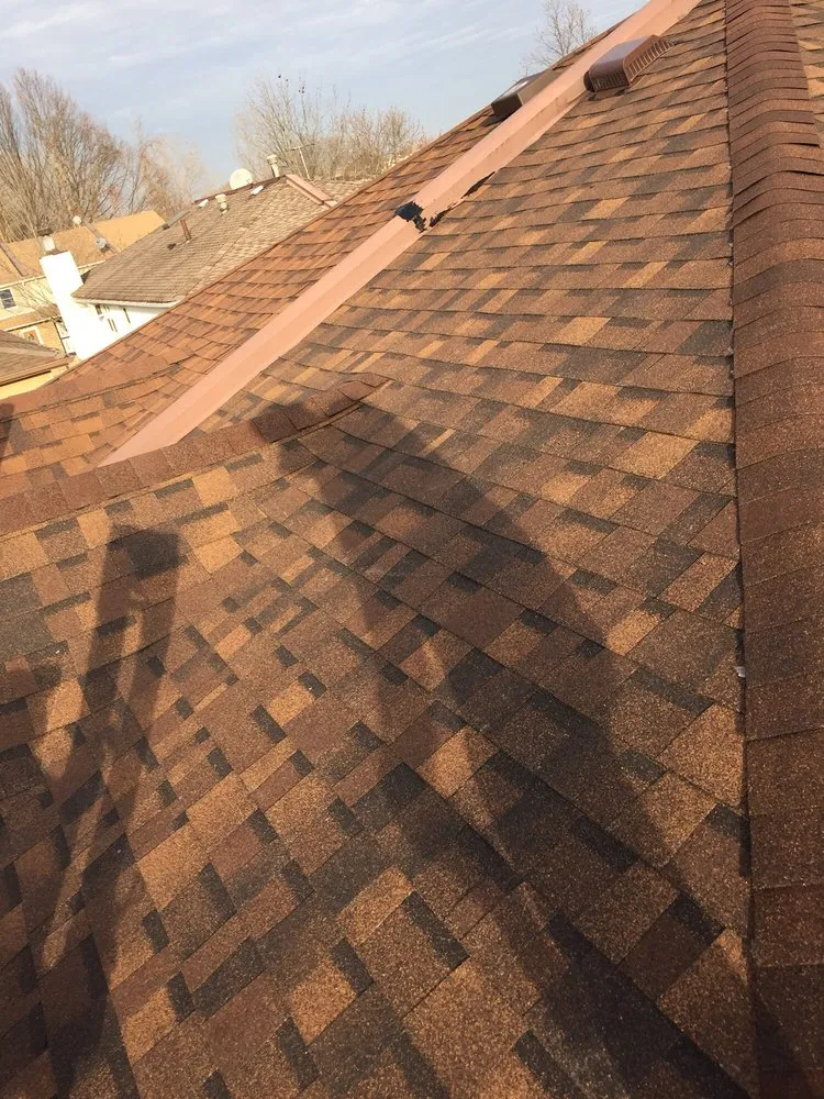 Slide of Vinny's Roofing & Home Improvement