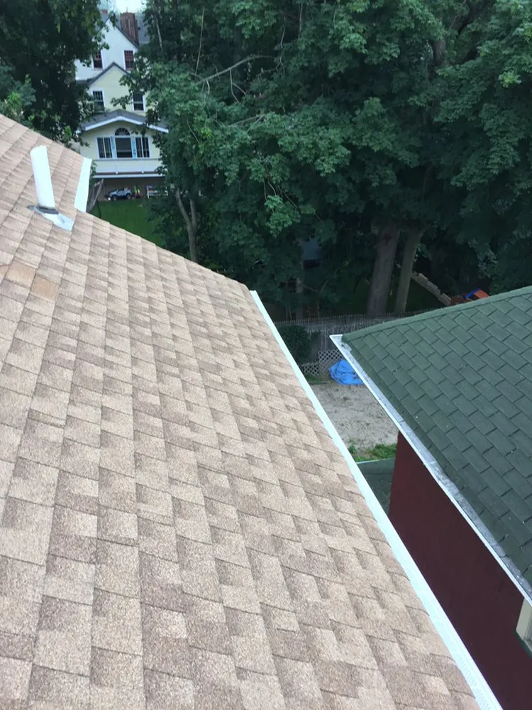 Slide of Vinny's Roofing & Home Improvement