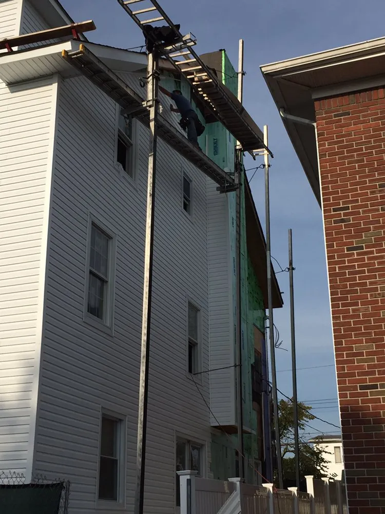 Slide of Vinny's Roofing & Home Improvement