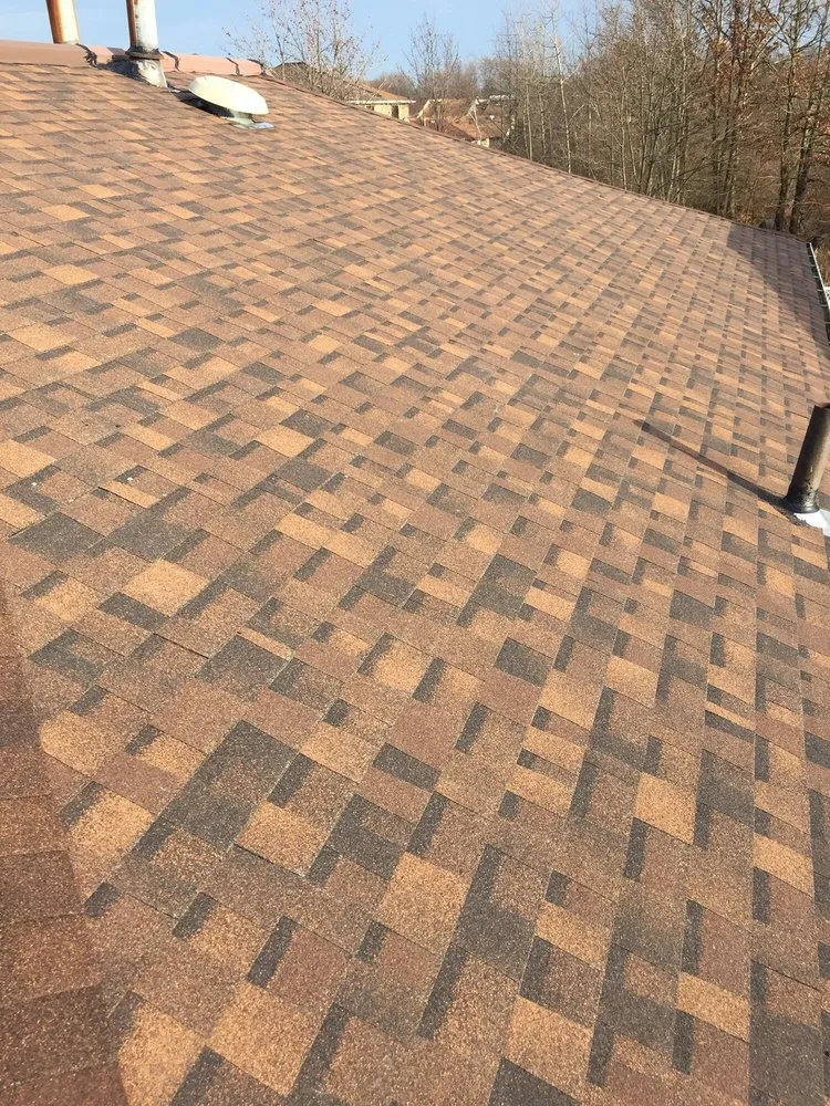 Slide of Vinny's Roofing & Home Improvement