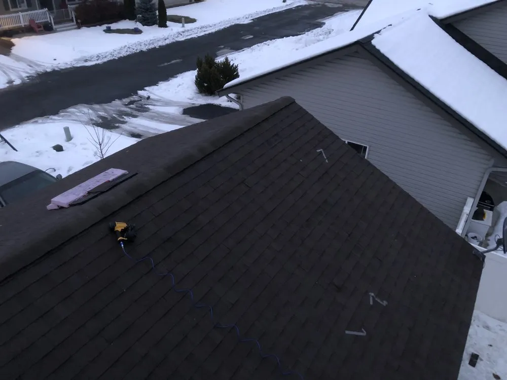 Slide of Vinson Roofing