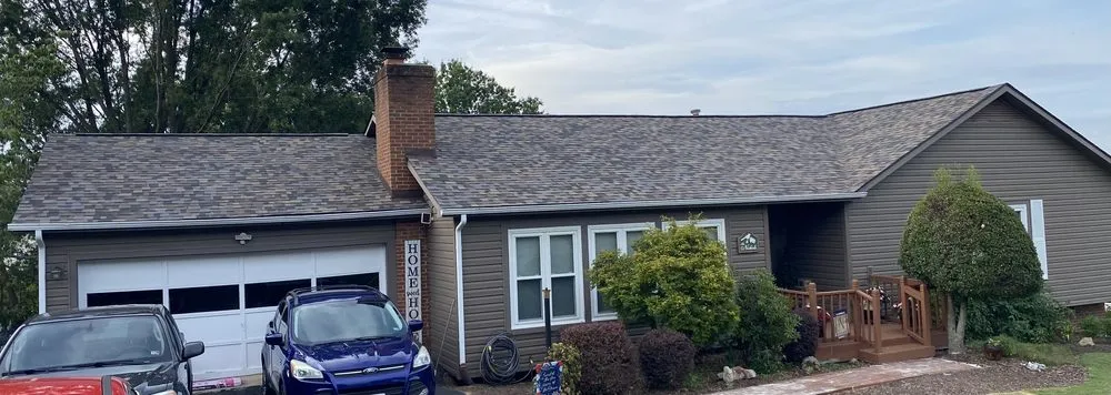 Slide of Vinton Roofing Company