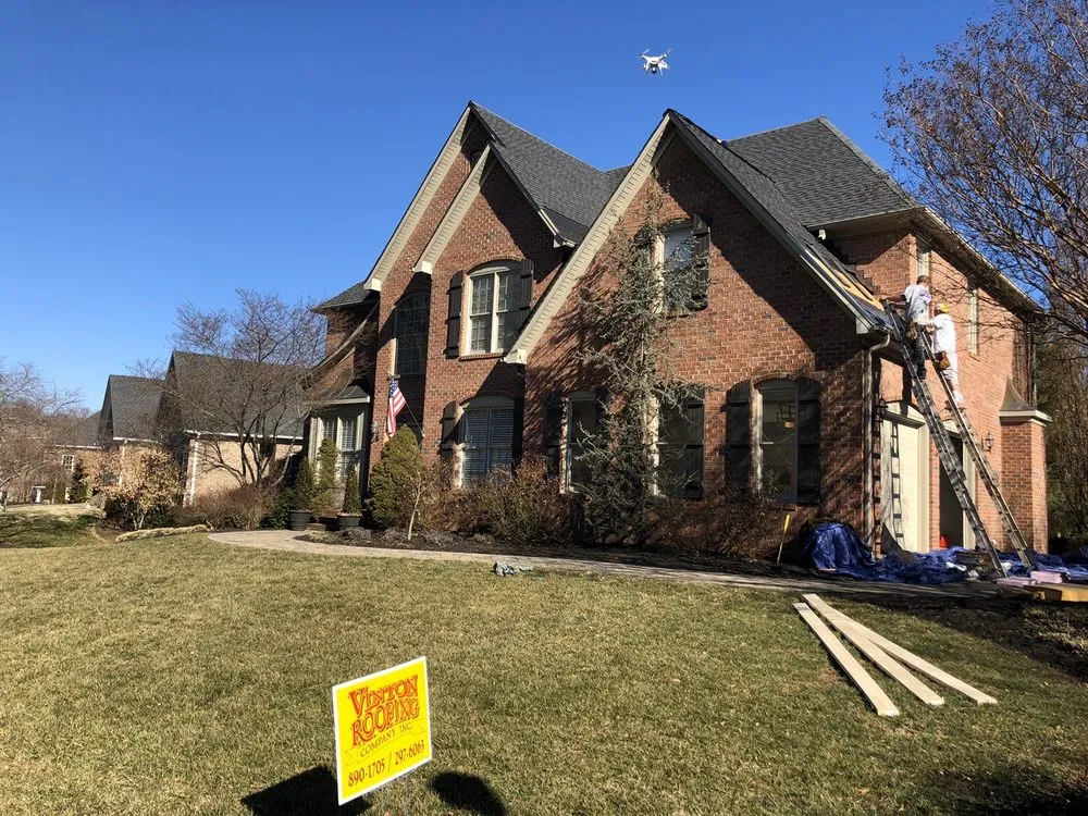 Slide of Vinton Roofing Company