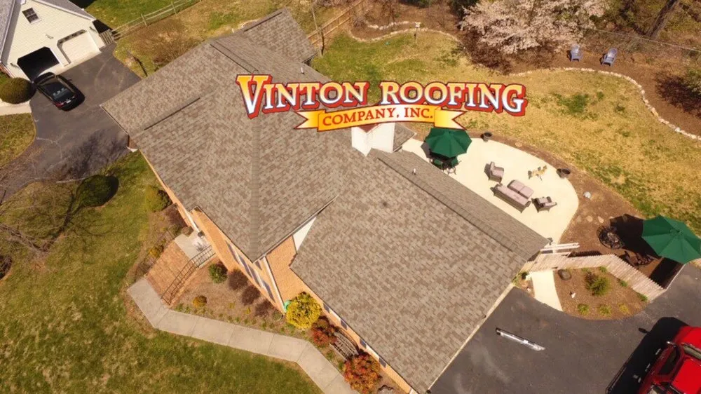 Slide of Vinton Roofing Company