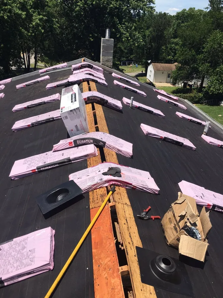 Slide of Vinton Roofing Company