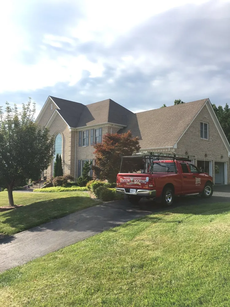 Slide of Vinton Roofing Company