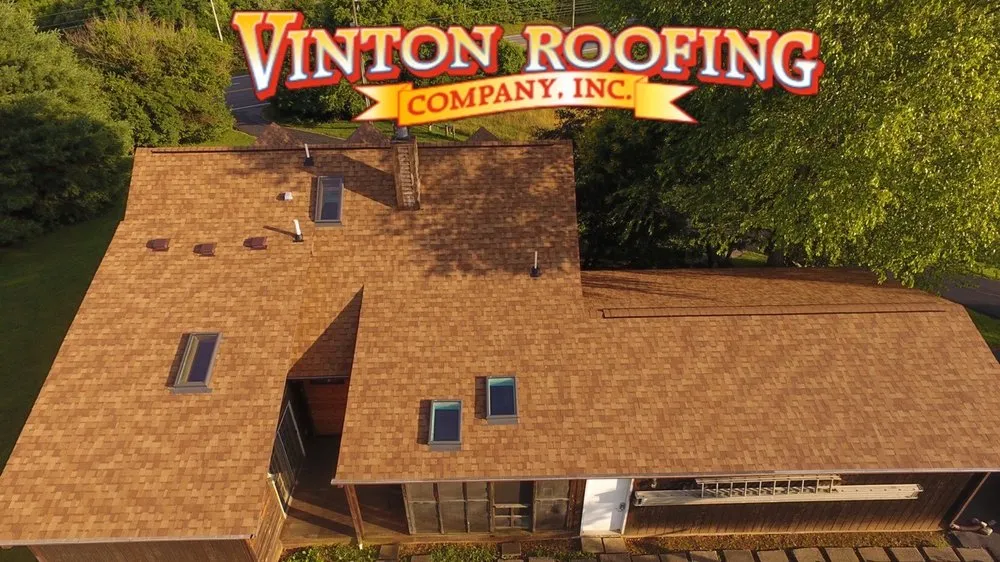 Slide of Vinton Roofing Company
