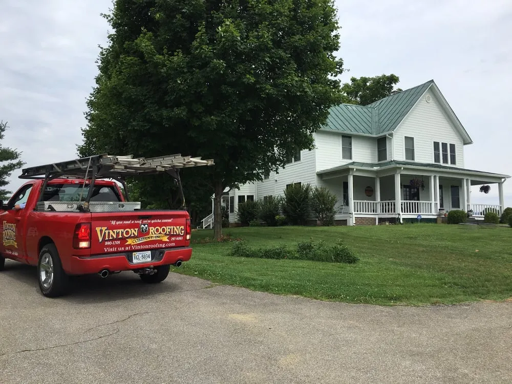 Slide of Vinton Roofing Company