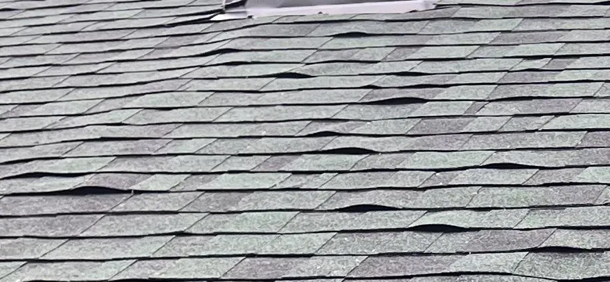 Slide of Vinton Roofing Company