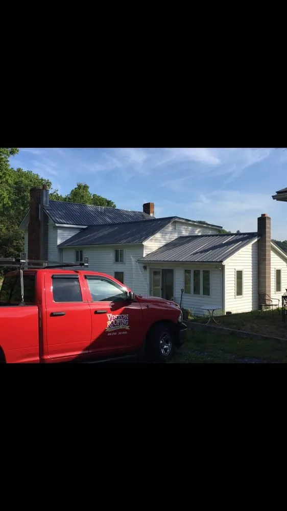 Slide of Vinton Roofing Company
