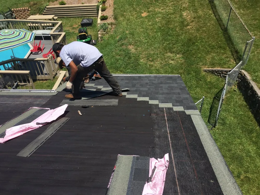 Slide of Vinton Roofing Company