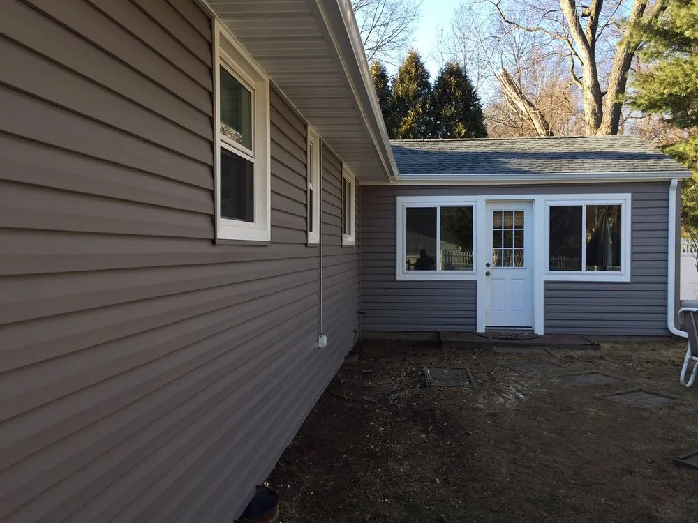 Slide of Vinyl Master Home Improvement