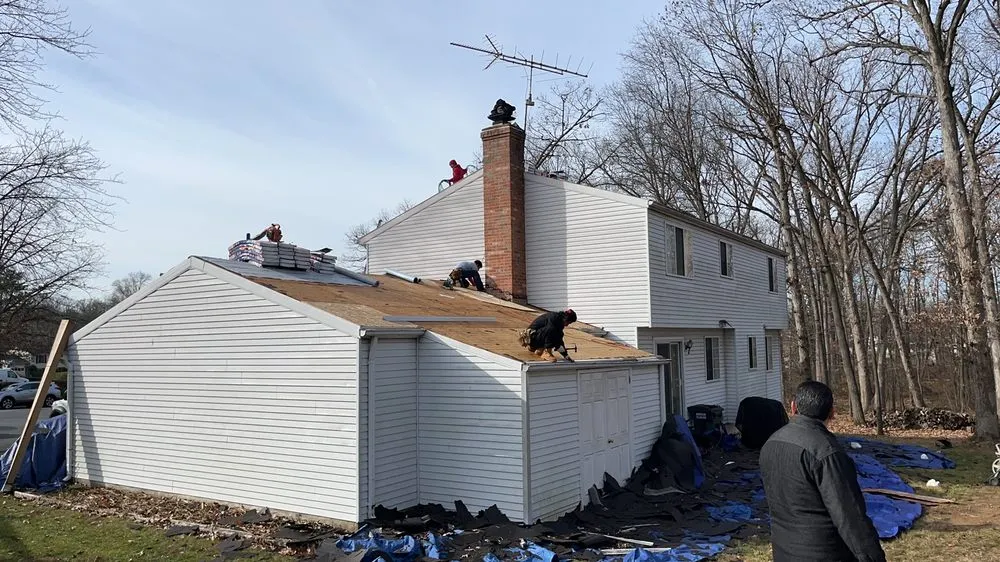Slide of Virginia’s Roofing Expert