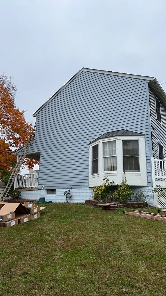 Slide of Virginia’s Roofing Expert