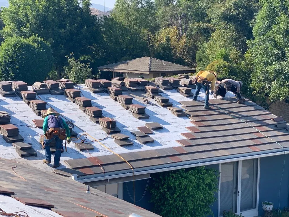 Slide of Vision Roofing