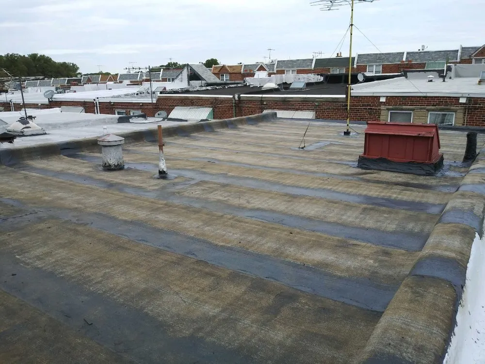 Slide of Visionary Roofing The Coating Specialists