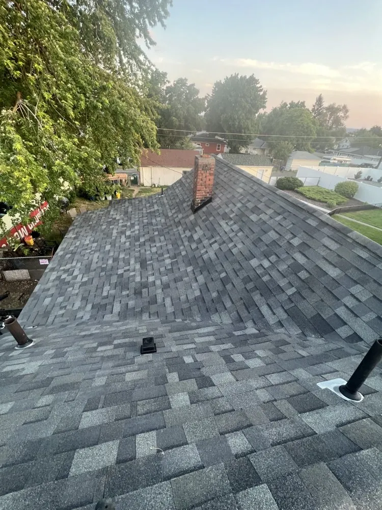 Slide of Vital Roofing